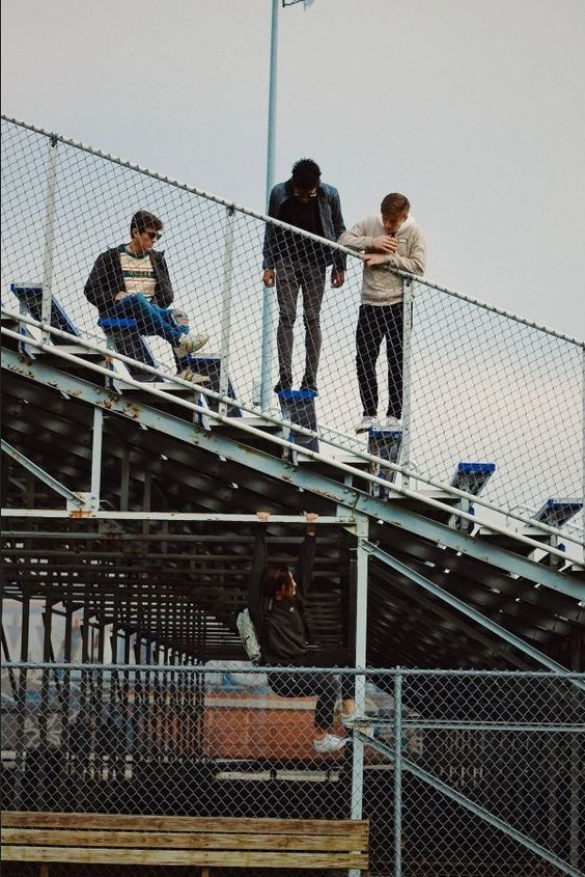 Teenagers on bleachers